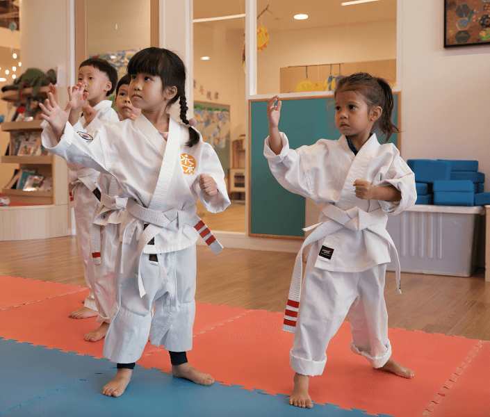 Children practicing martial arts at Penn Junior Academy